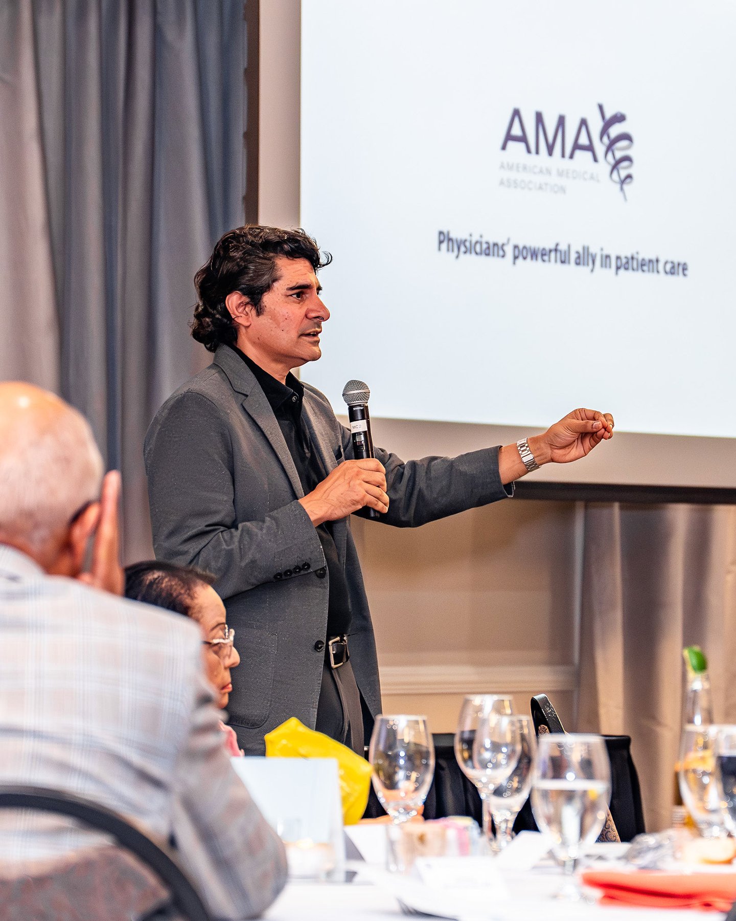 A keynote speaker addressing the audience