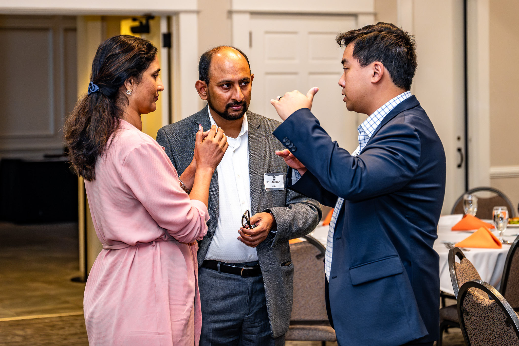 Attendees connecting in conversation